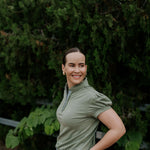 Kate khaki ruffled collar women's polo shirt back view showing relaxed women's fit in khaki