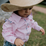 Lara multi stripe pink ruffle long sleeve romper fabric close-up showing quality pink stripe cotton