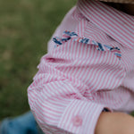 Lara multi stripe pink ruffle long sleeve romper collar detail showing neat neckline finish