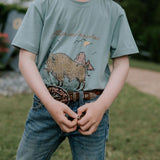 Free Range bison graphic kids tee worn by child showing fun Free Range bison graphic country style