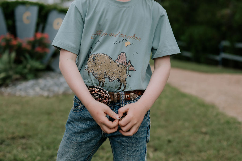 Free Range bison graphic kids tee worn by child showing fun Free Range bison graphic country style