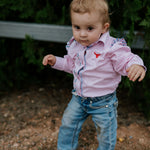 Lara multi stripe pink ruffle long sleeve romper front view showing sweet pink stripe romper with ruffle for toddlers