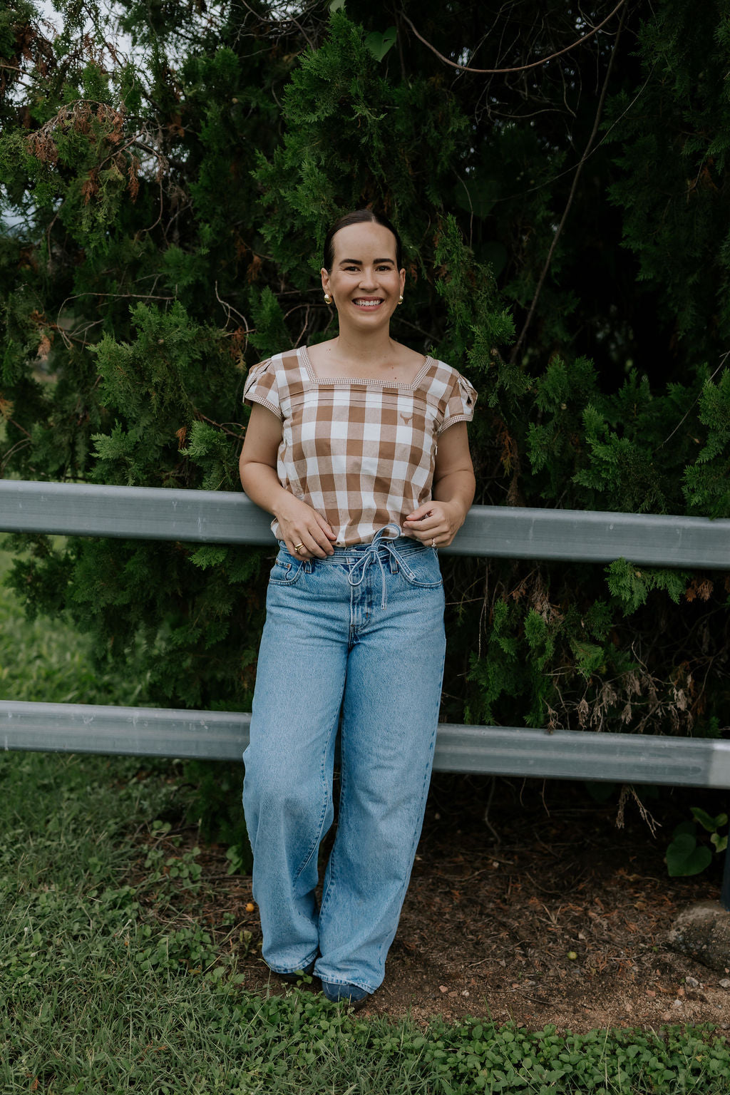 Dusty gingham women's blouse cuff detail showing quality sleeve and button finish
