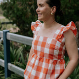 Narla linen orange check women's blouse front view showing chic orange check linen blouse for women