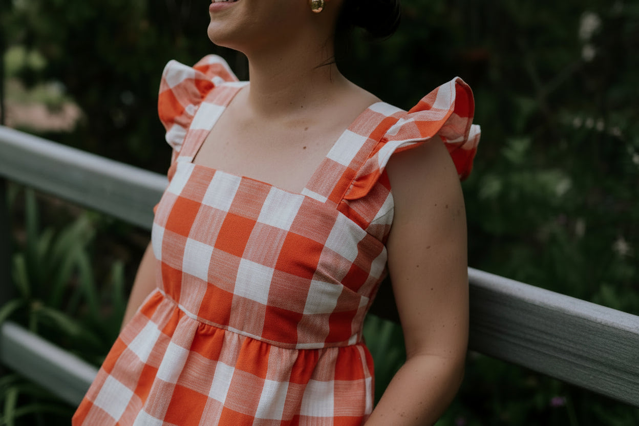 Orange check linen women's blouse fabric close-up showing quality orange check linen weave