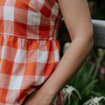 Mya NURSING linen orange check women's blouse nursing access detail showing discreet nursing opening in orange check linen
