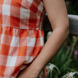 Mya NURSING linen orange check women's blouse nursing access detail showing discreet nursing opening in orange check linen