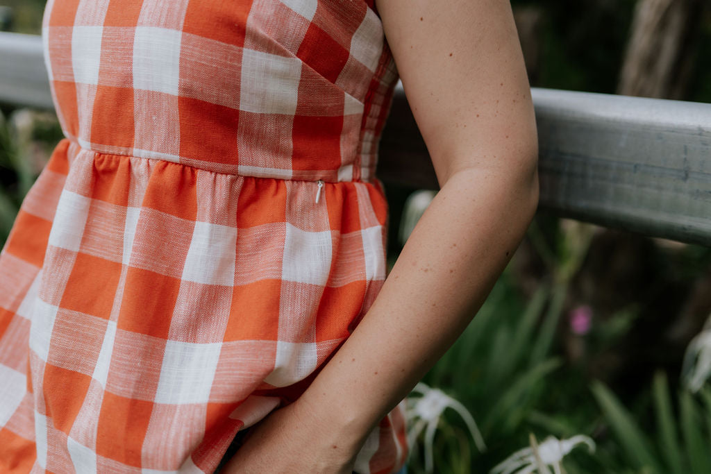 Mya NURSING linen orange check women's blouse nursing access detail showing discreet nursing opening in orange check linen