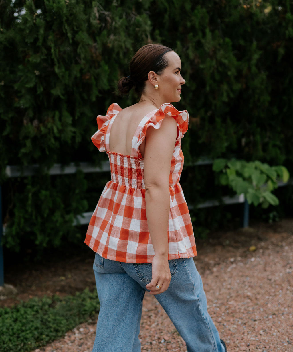 Orange check linen women's blouse worn showing stylish country casual women's look in orange check