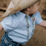 Dasha soft baby blue gingham short sleeve romper snap detail showing quality press stud