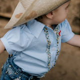 Dasha soft baby blue gingham short sleeve romper snap detail showing quality press stud