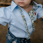 Dasha soft baby blue gingham short sleeve romper worn showing adorable soft blue check country style