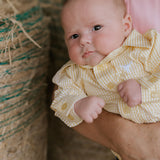Sunshine lemon long sleeve romper collar detail showing neat neckline finish in lemon