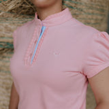 KK pink ruffled collar women's polo shirt back view showing relaxed women's fit in pink