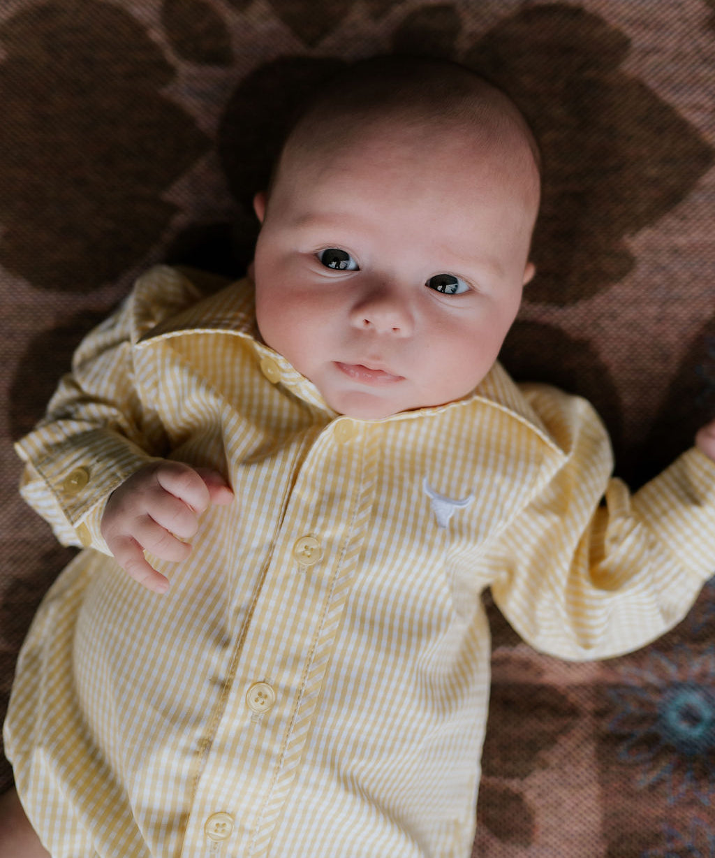 Sunshine lemon long sleeve romper front view showing bright lemon yellow romper for toddlers