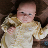 Sunshine lemon long sleeve romper front view showing bright lemon yellow romper for toddlers