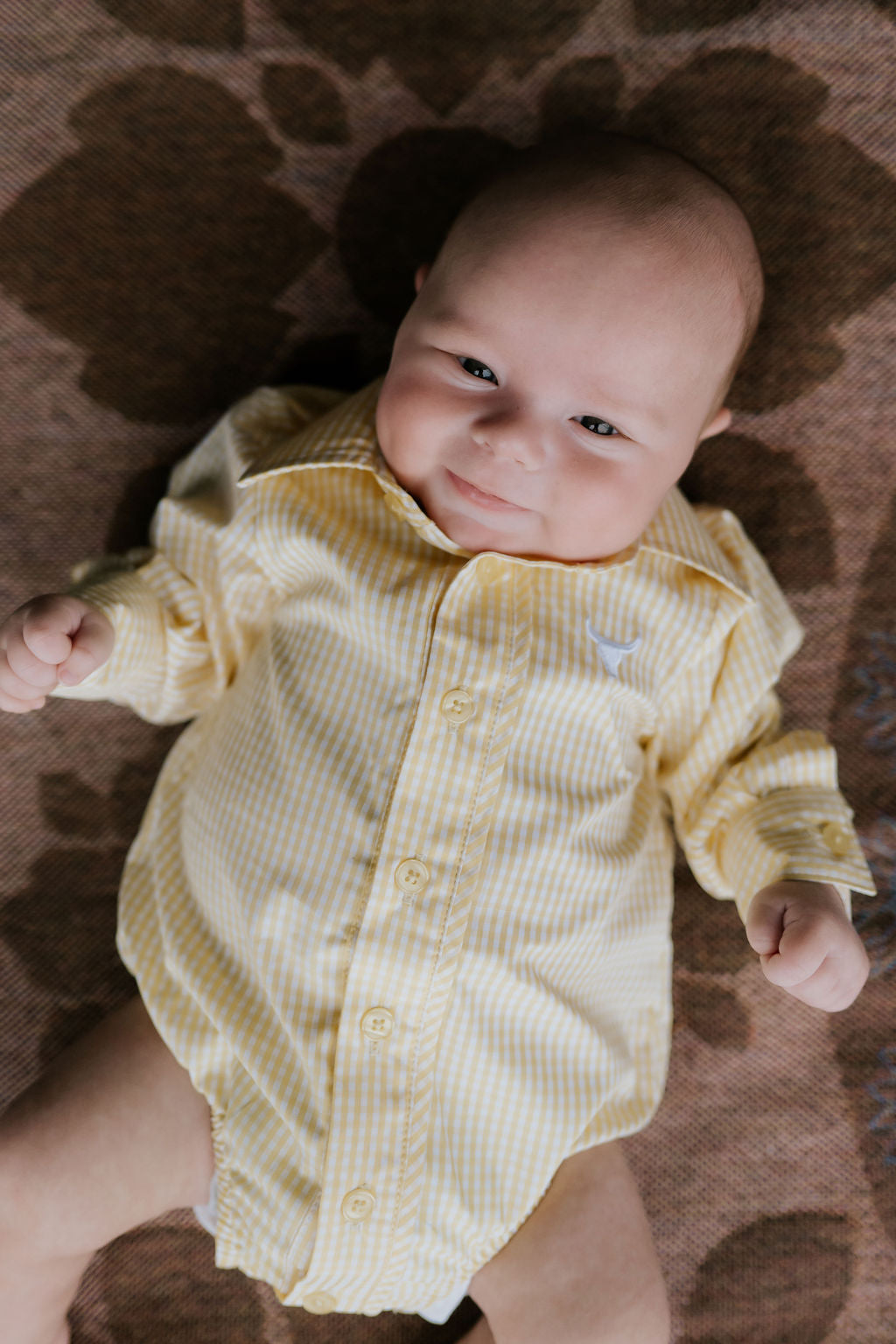 Sunshine lemon long sleeve romper worn by toddler showing cheerful lemon yellow country style