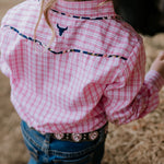 Stella pink check western yoke long sleeve shirt back view showing relaxed women's fit and western yoke