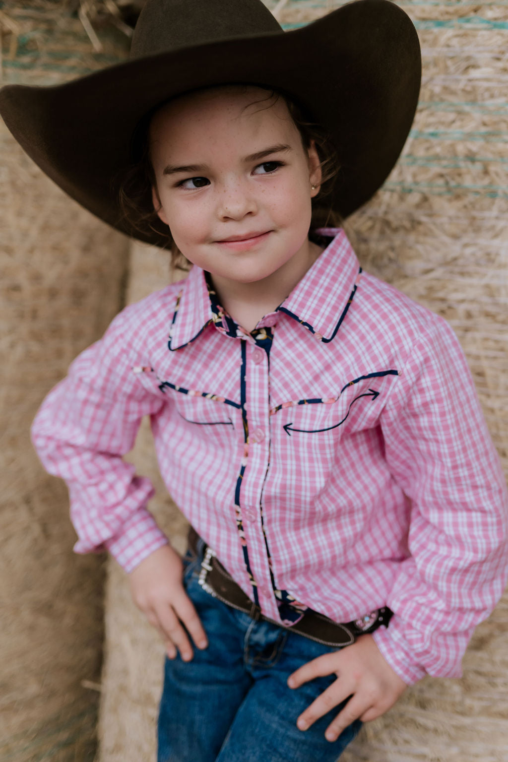 Stella pink check western yoke long sleeve shirt front view showing pretty pink check shirt with western yoke detail