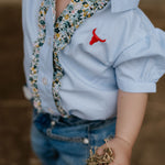 Dasha soft baby blue gingham short sleeve romper front view showing sweet soft blue check romper