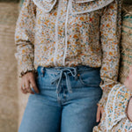 Britt yellow floral women's shirt back view showing relaxed women's fit in yellow floral print
