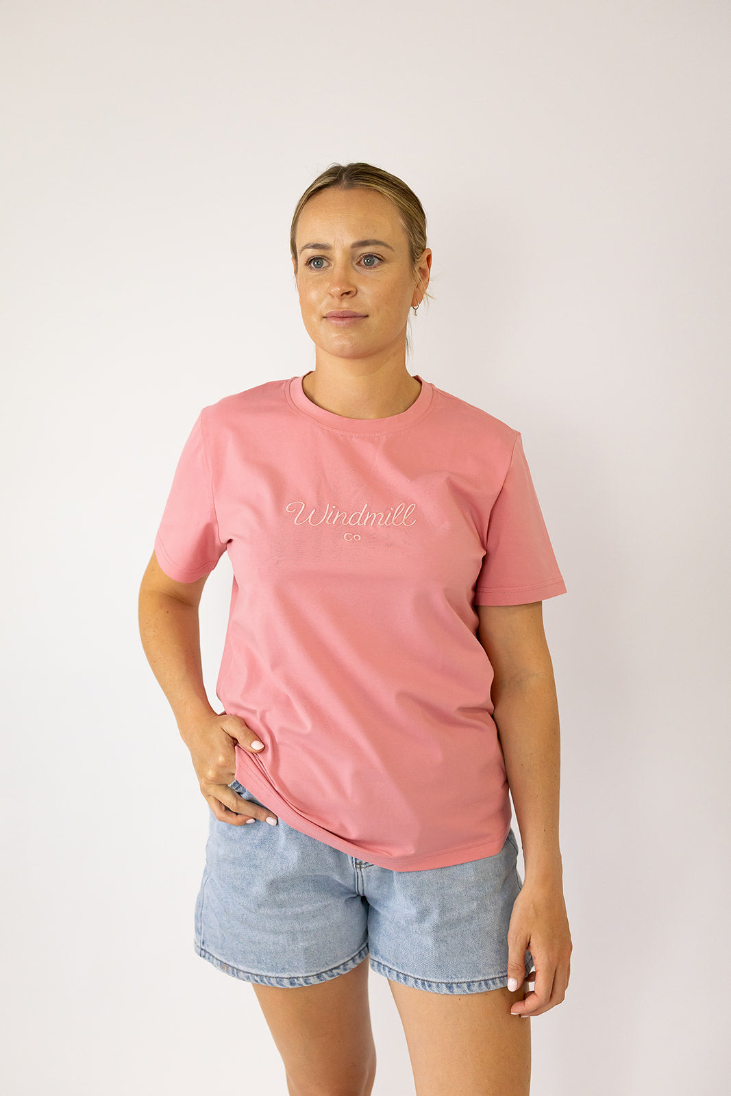 LIMITED EDITION embroidered ladies tee dust pink flat lay showing full design and warm dust pink