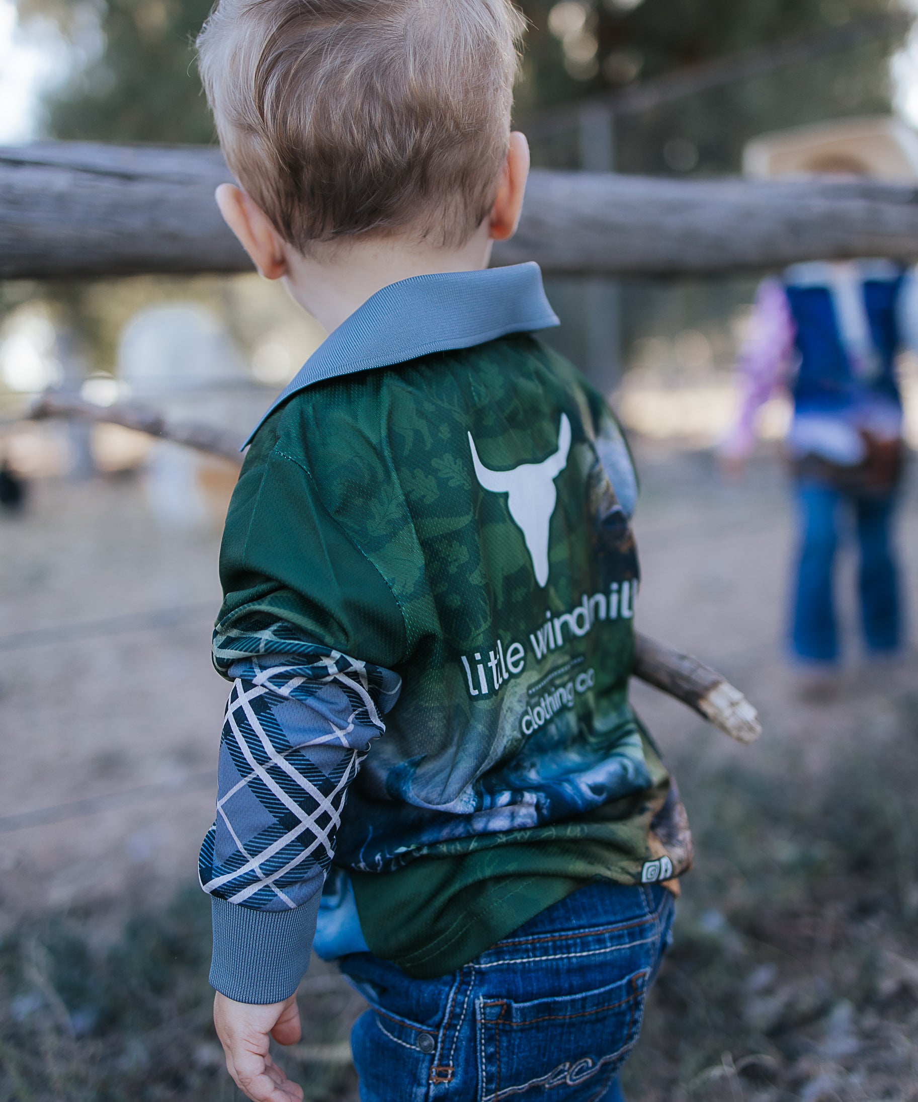 Hunting scrub green long sleeve fishing shirt worn showing functional outdoor country style in scrub green