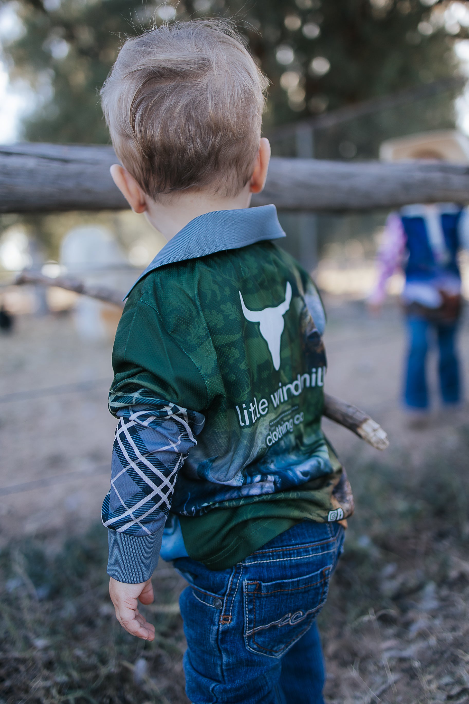 Hunting scrub green long sleeve fishing shirt worn showing functional outdoor country style in scrub green