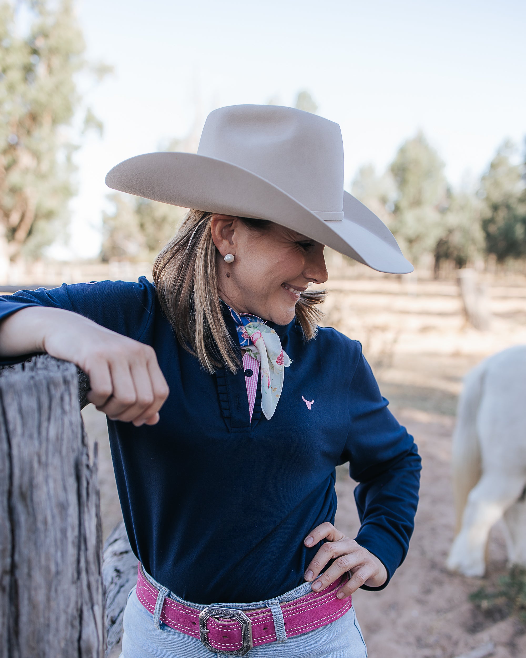 Bella women's long sleeve navy gingham ruffle collar contrast polo ruffle detail showing beautiful navy ruffle collar