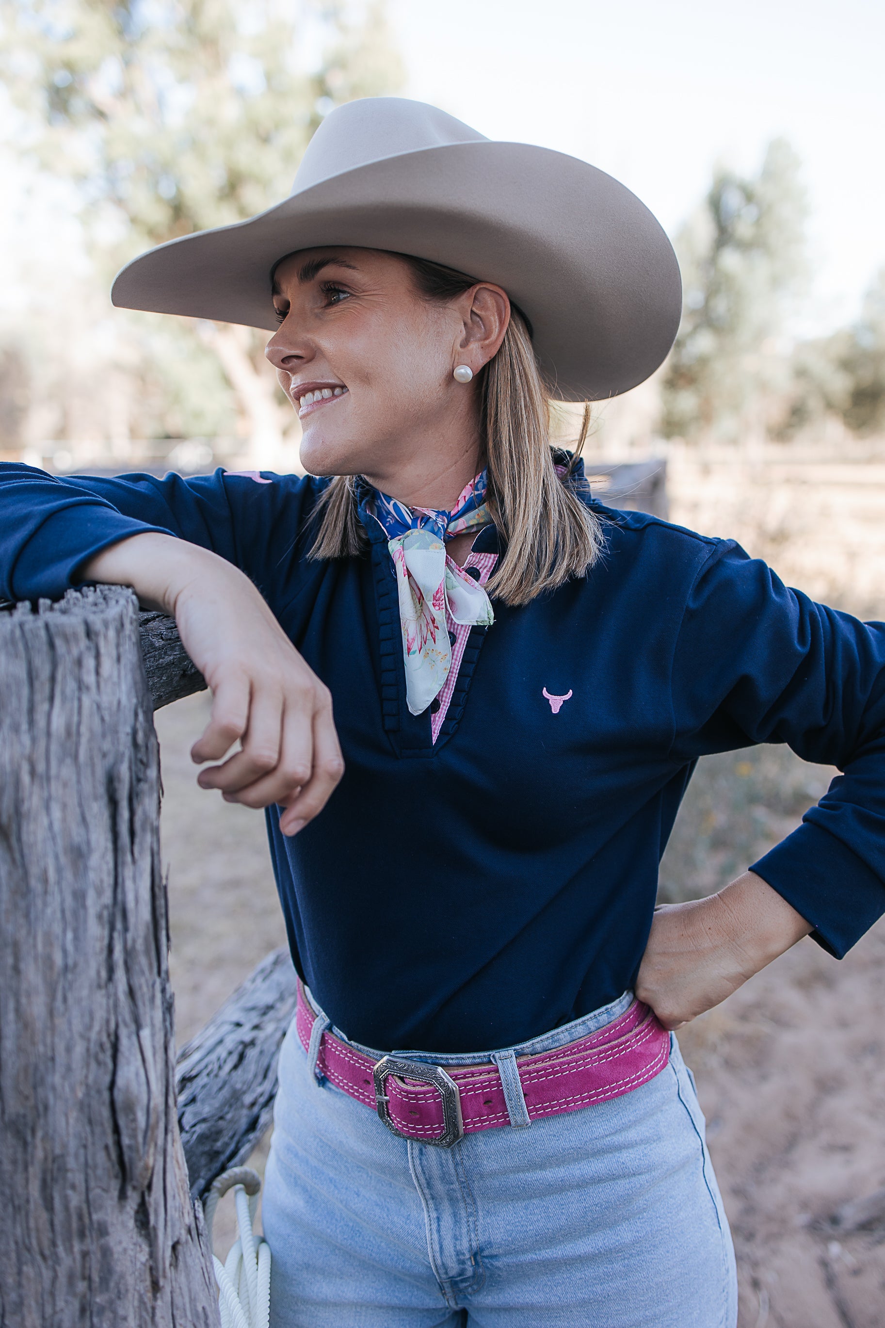 Bella women's long sleeve navy gingham ruffle collar contrast polo collar close-up showing contrast trim detail