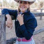 Bella women's long sleeve navy gingham ruffle collar contrast polo front view showing elegant navy gingham women's polo