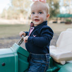 BB Baby navy ruffle pink gingham contrast long sleeve baby polo romper snap detail showing quality press stud closure