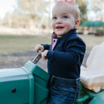 BB Baby navy ruffle pink gingham contrast long sleeve baby polo romper fabric close-up showing quality gingham cotton