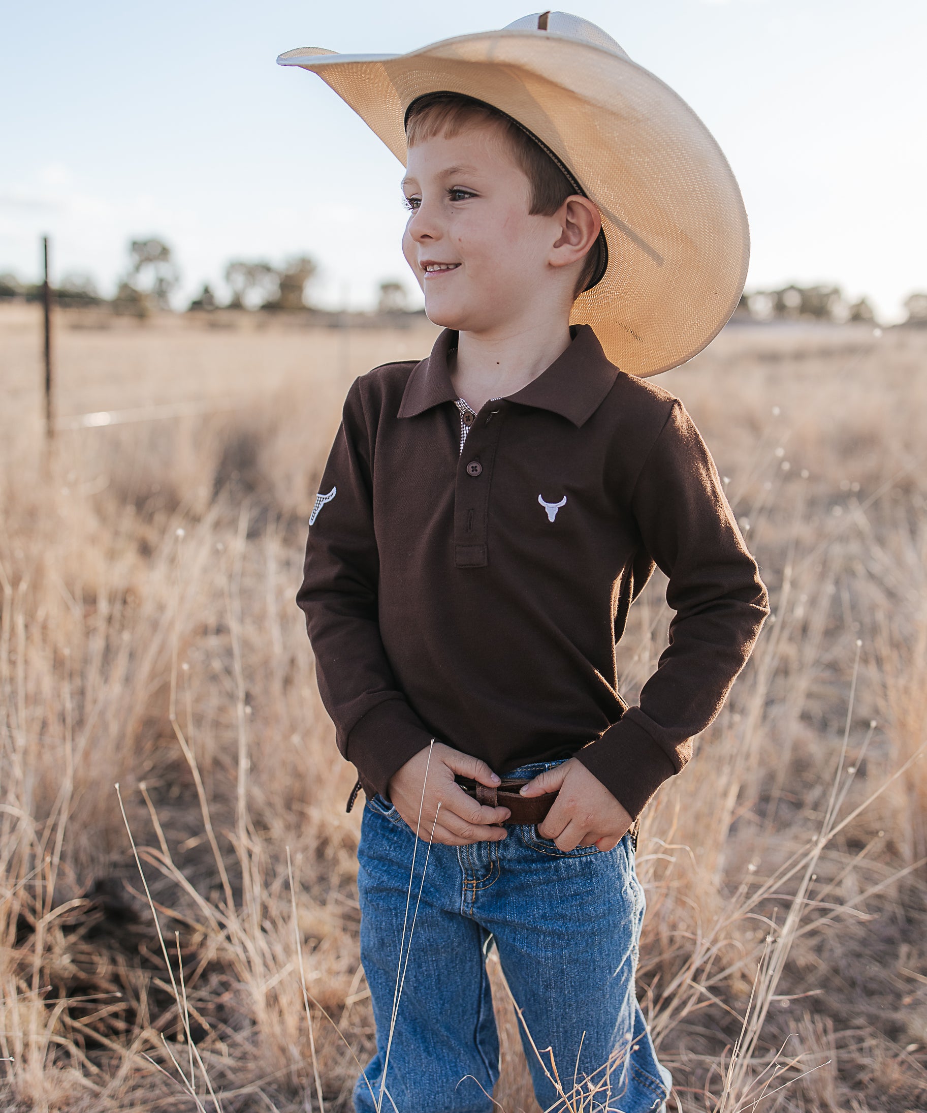 Hanley chocolate gingham contrast long sleeve boy's polo back view showing relaxed boys fit in chocolate gingham