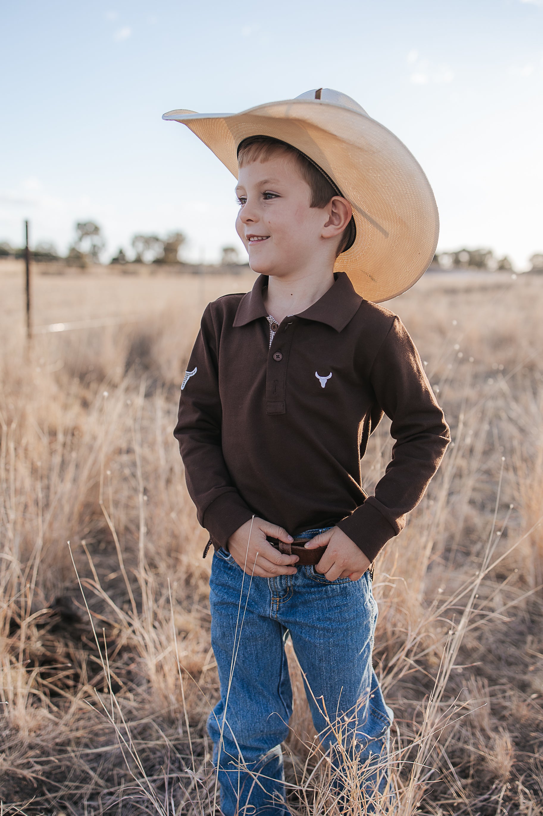 Hanley chocolate gingham contrast long sleeve boy's polo back view showing relaxed boys fit in chocolate gingham
