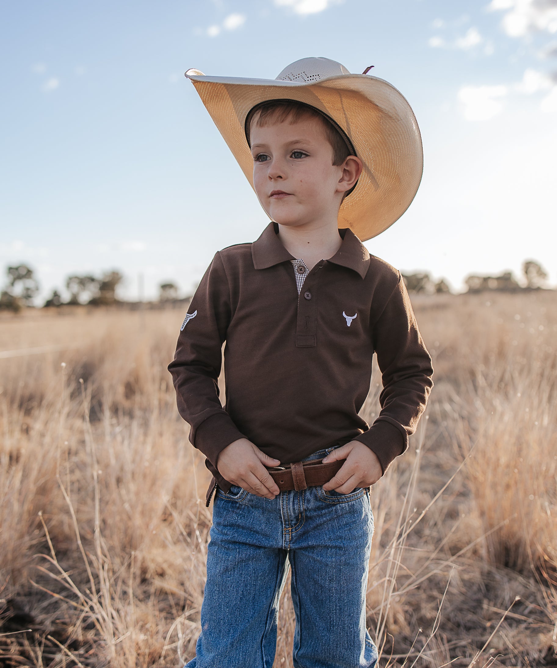Hanley chocolate gingham contrast long sleeve boy's polo front view showing classic chocolate gingham boys polo