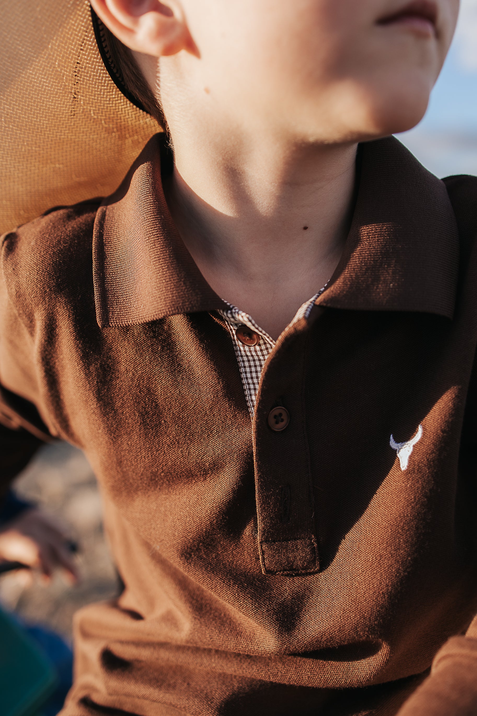 Hanley chocolate gingham contrast long sleeve boy's polo size range showing available boys sizes