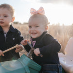 BB Baby navy ruffle pink gingham contrast long sleeve baby polo romper ruffle detail showing sweet navy ruffle collar