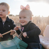 BB Baby navy ruffle pink gingham contrast long sleeve baby polo romper ruffle detail showing sweet navy ruffle collar