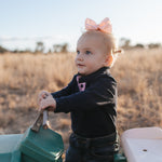 BB Baby navy ruffle pink gingham contrast long sleeve baby polo romper worn showing sweet baby navy pink gingham style