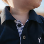 Bandon Jnr navy gingham contrast long sleeve polo back view showing relaxed boys fit in navy gingham