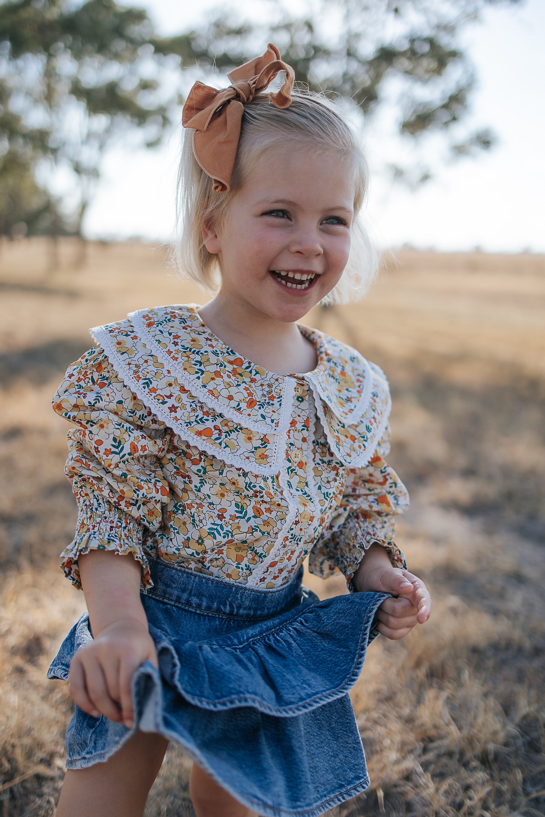 Elsie girls butter yellow floral long sleeve blouse print close-up showing detailed yellow floral pattern