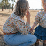 Britt yellow floral women's shirt collar detail showing neat neckline on yellow floral print