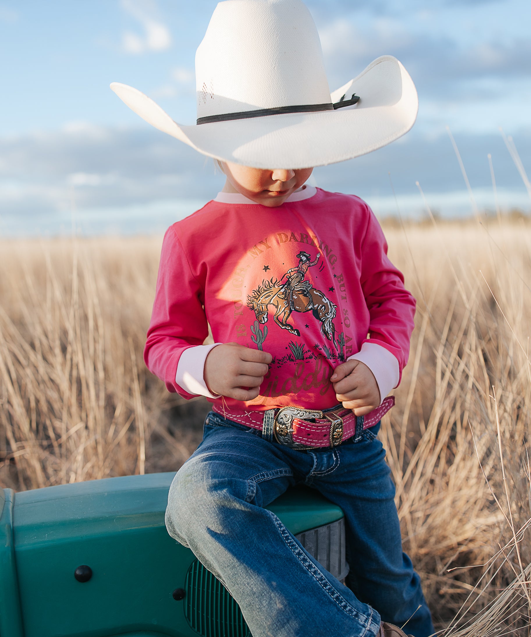 Luna Ride Hard pink long sleeve tee back view showing relaxed fit in pink with graphic print