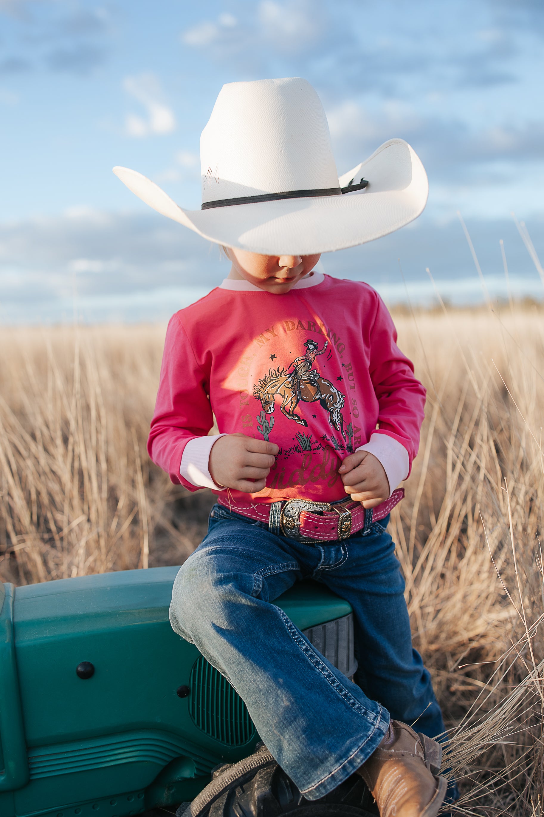 Luna Ride Hard pink long sleeve tee back view showing relaxed fit in pink with graphic print