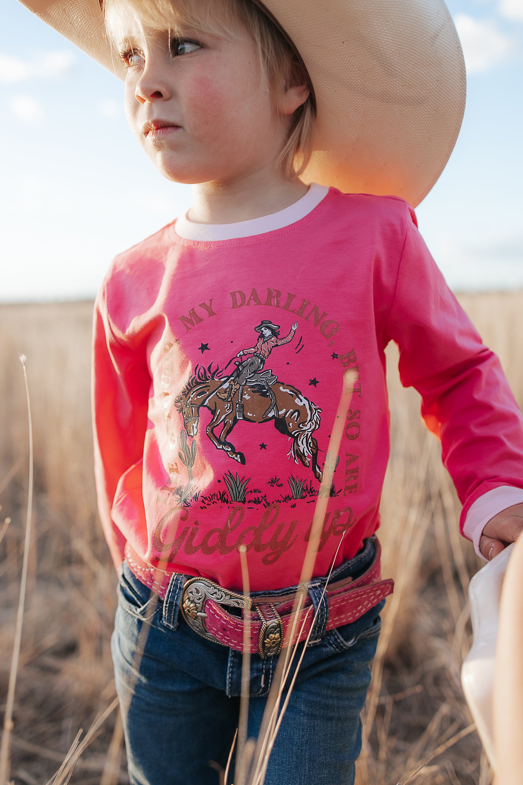 Luna Ride Hard pink long sleeve tee size range showing available women's sizes