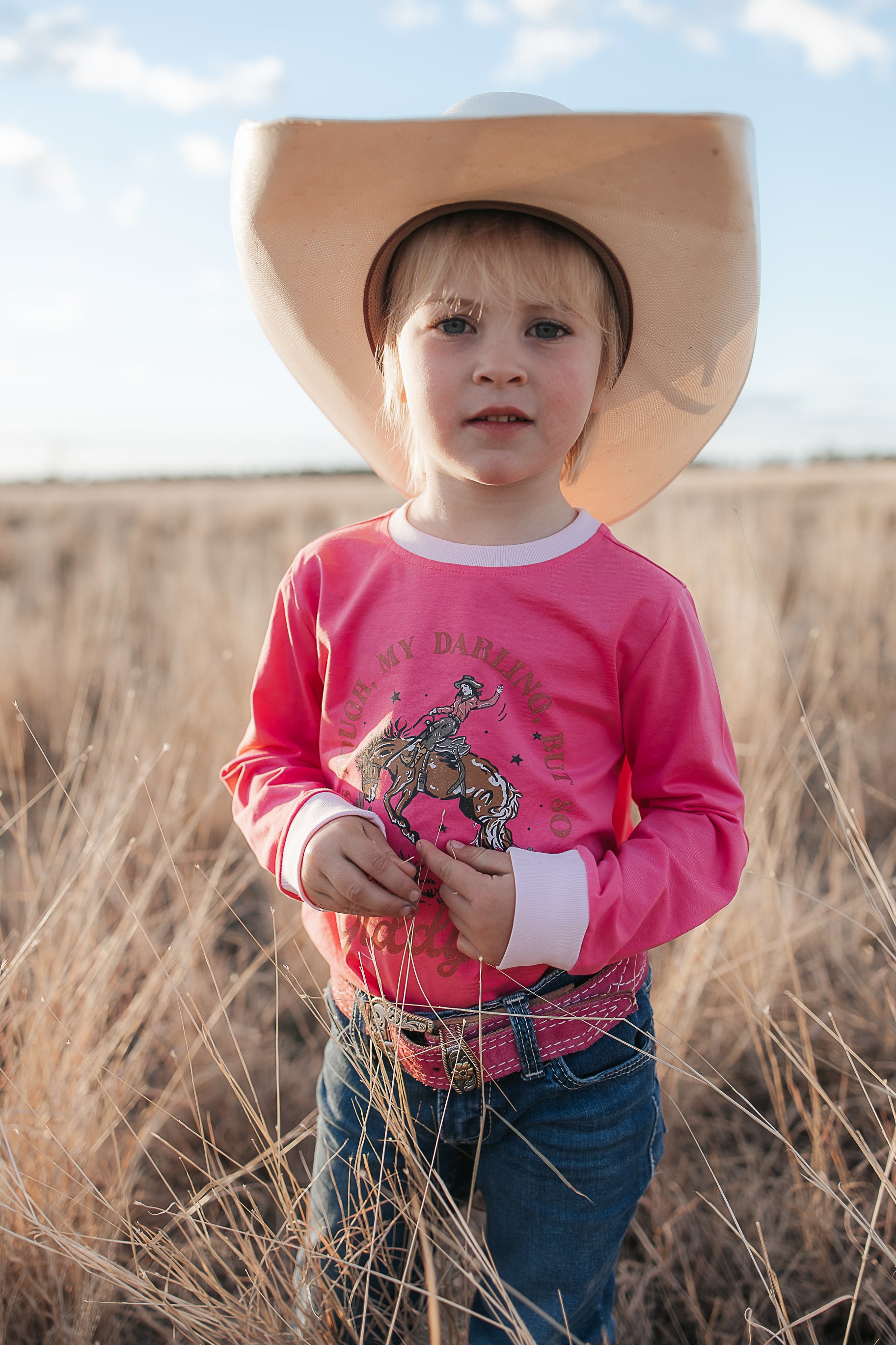 Luna Ride Hard pink long sleeve tee fabric close-up showing quality soft cotton pink fabric