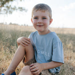 LWCC embroidered kids tee powder blue worn by child showing boutique quality in powder blue