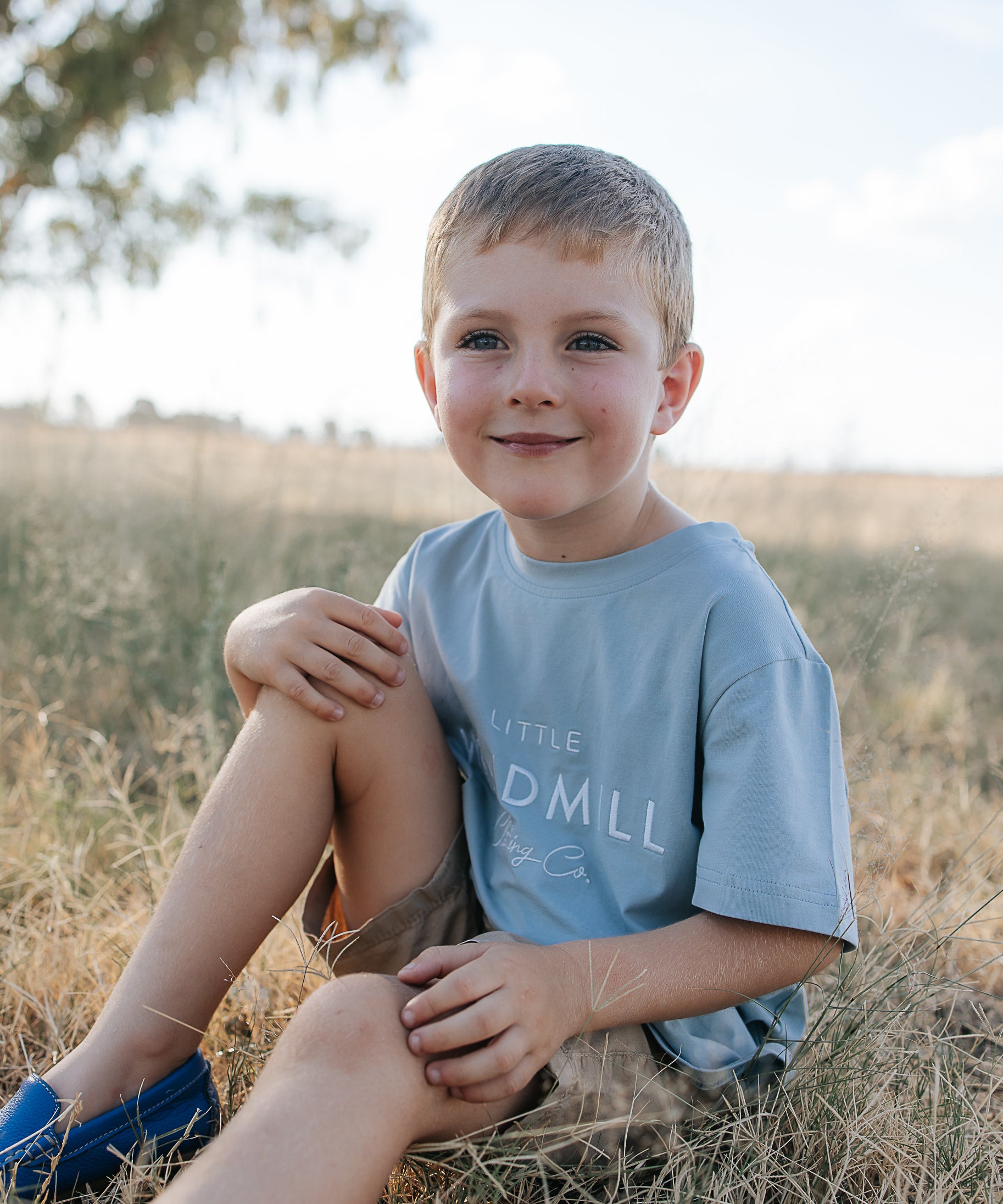 LWCC embroidered kids tee powder blue worn by child showing boutique quality in powder blue