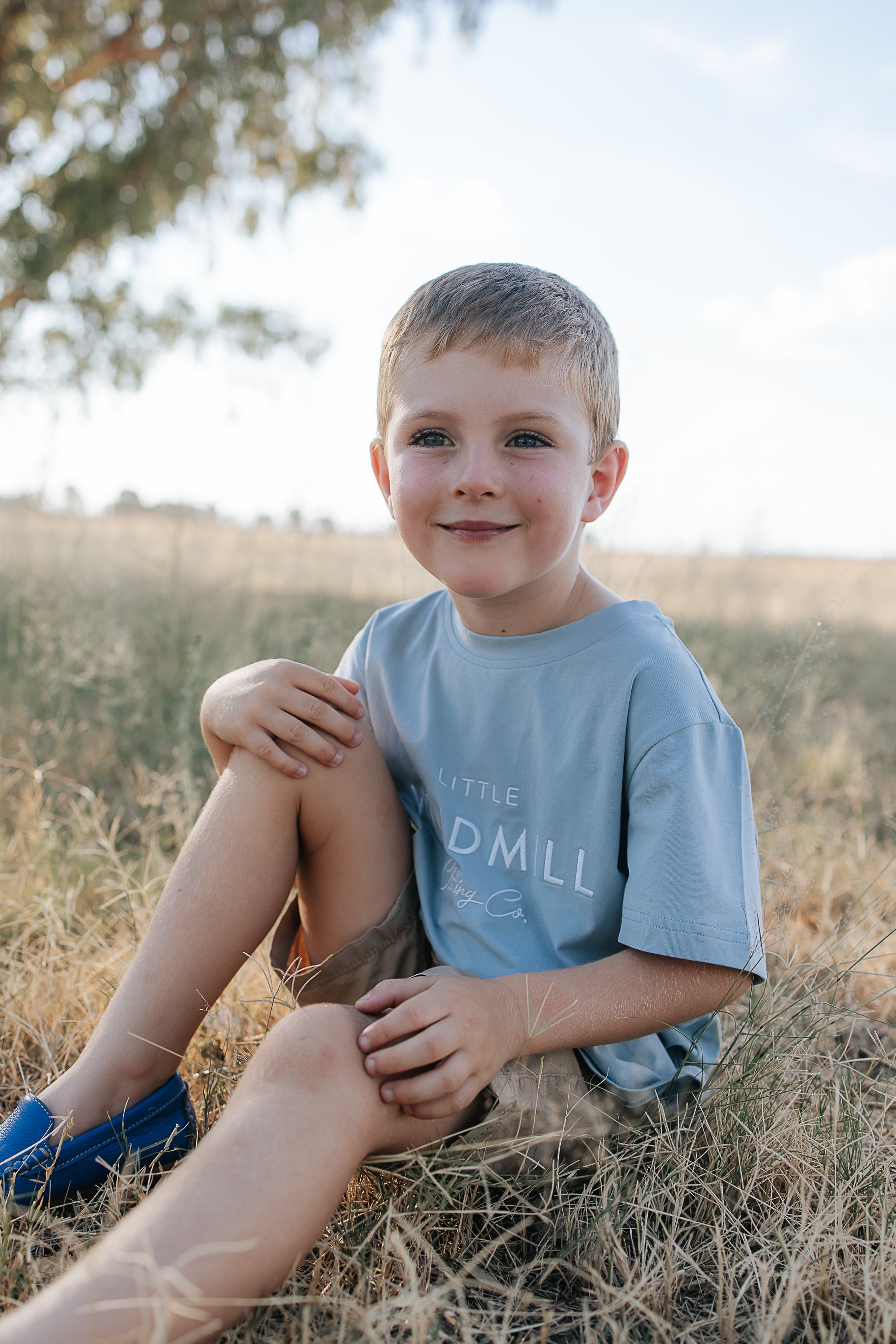 LWCC embroidered kids tee powder blue worn by child showing boutique quality in powder blue